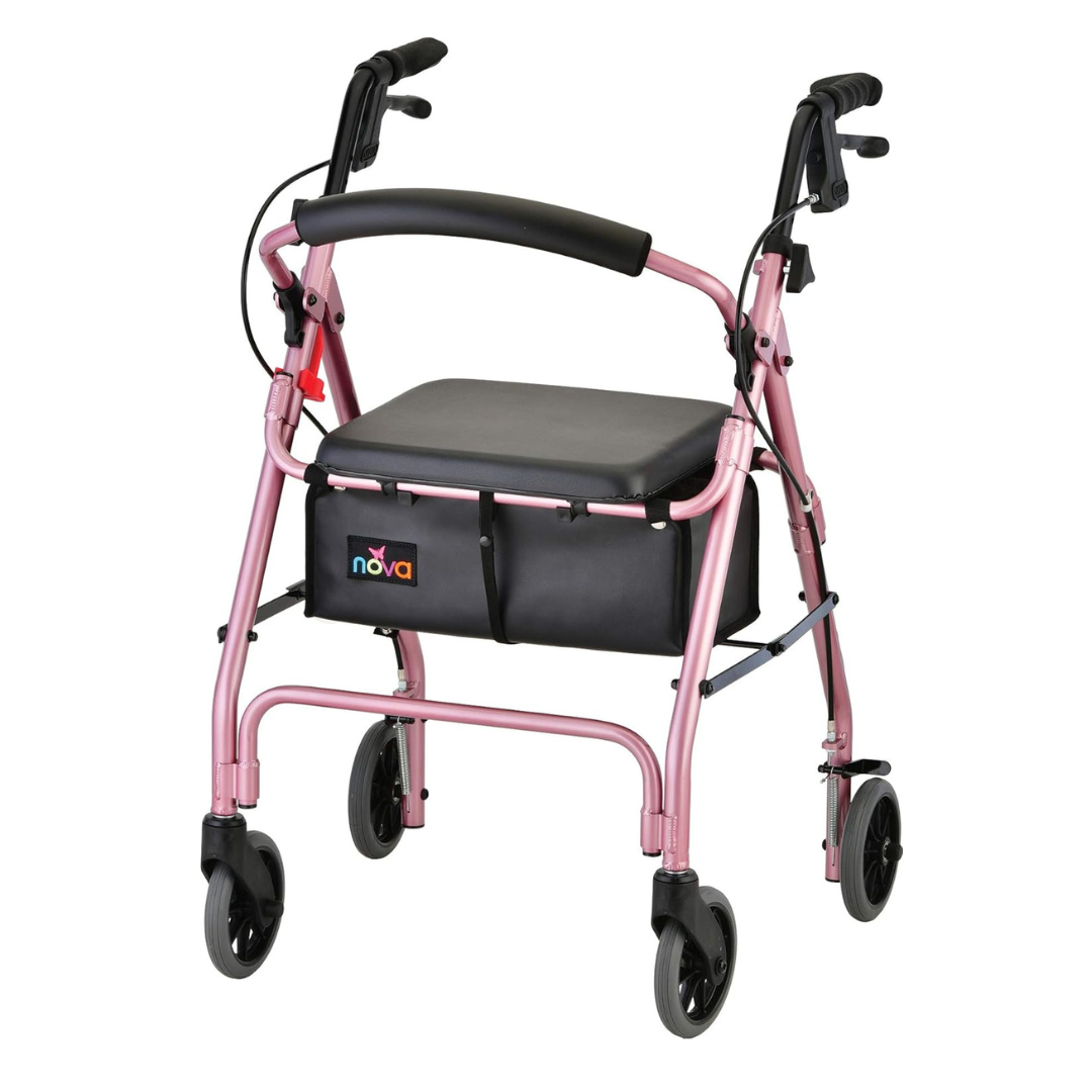 The Nova Medical GetGo Rolling Rollator Walker is a pink mobility aid with black handlebars and a padded seat. It has four wheels for easy movement, ergonomic hand grips with brakes, and a storage pouch beneath the seat, blending style and functionality effortlessly.